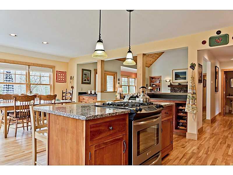 34 Omer Road Freeport, ME 04032 - Photo 10 of 35 Kitchen. The kitchen opens to the...