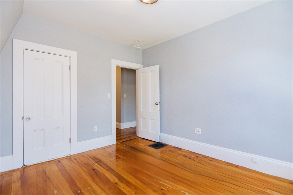 44 Cottage Street Lynn, MA 01905 - Photo 14 of 37 a view of empty room with wooden floor