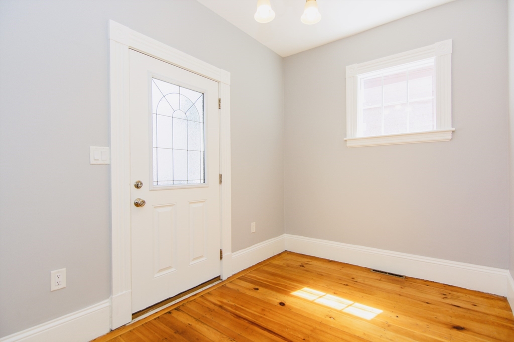44 Cottage Street Lynn, MA 01905 - Photo 25 of 37 a view of a room with wooden floor and pool table