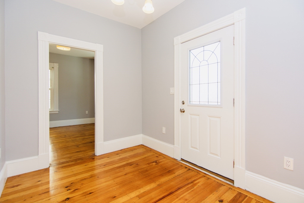 44 Cottage Street Lynn, MA 01905 - Photo 26 of 37 a view of empty room with wooden floor