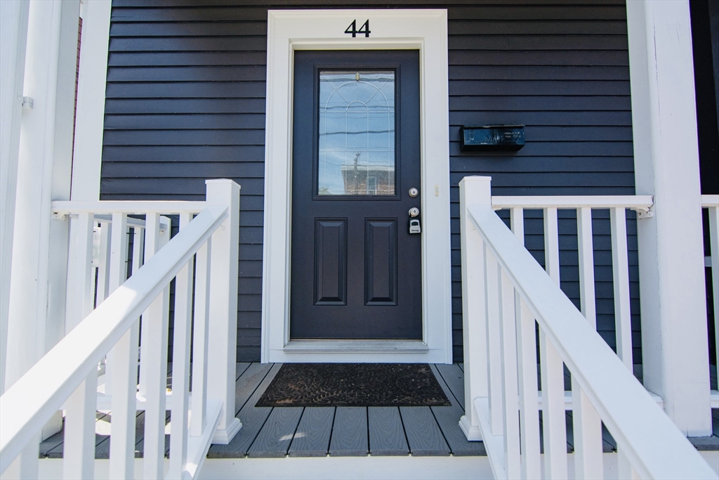 44 Cottage Street Lynn, MA 01905 - Photo 3 of 37 a view of a house with wooden floor