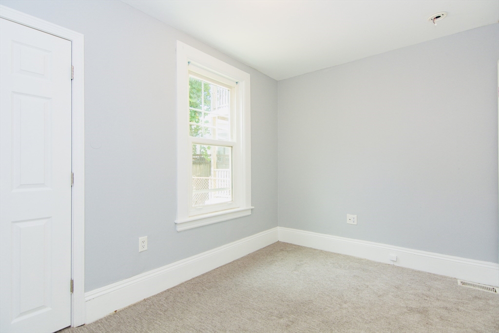 44 Cottage Street Lynn, MA 01905 - Photo 33 of 37 an empty room with a window