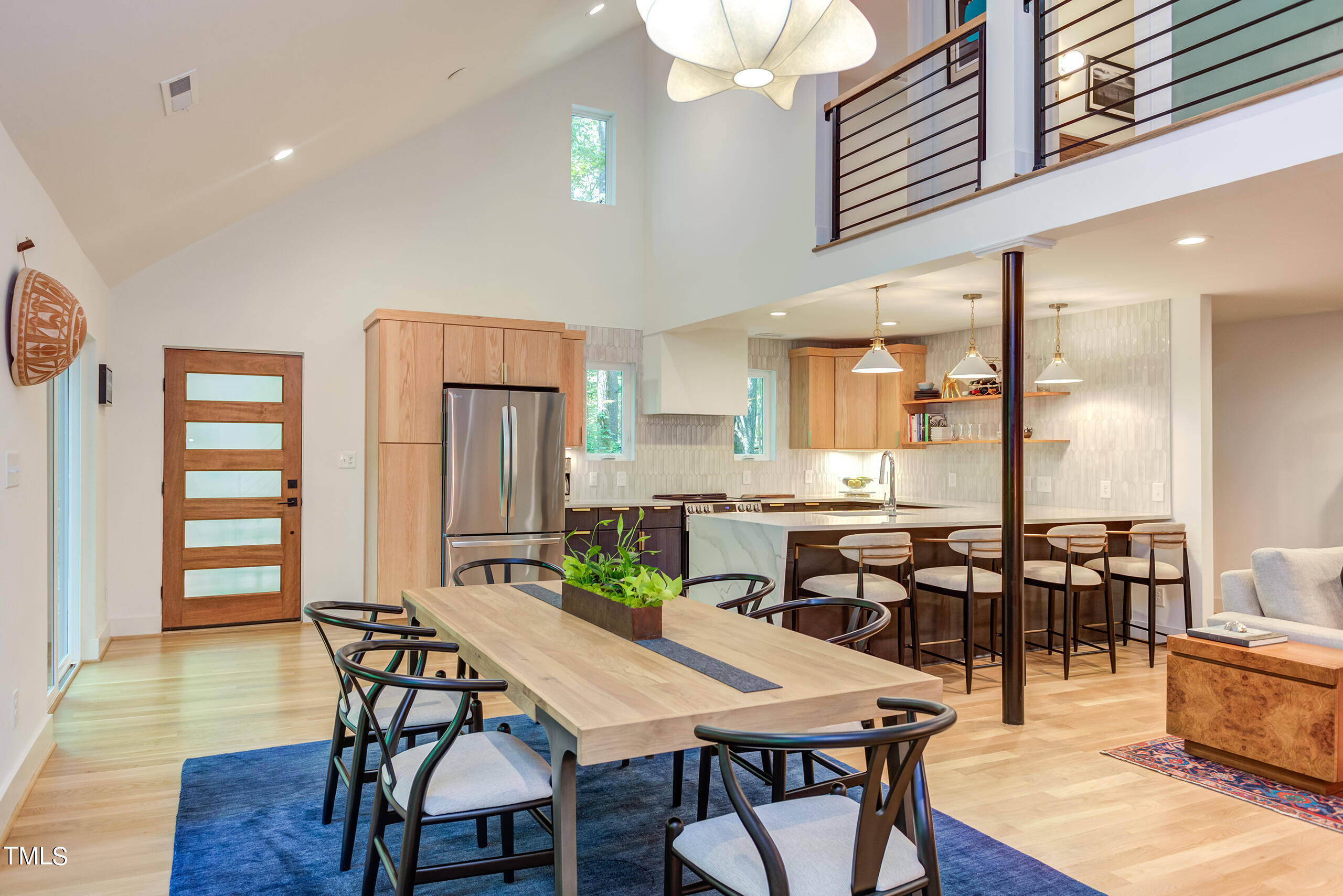 2008 Ridgewood Road Chapel Hill, NC 27516 - Photo 11 of 73 a view of a dining room with furniture and wooden floor