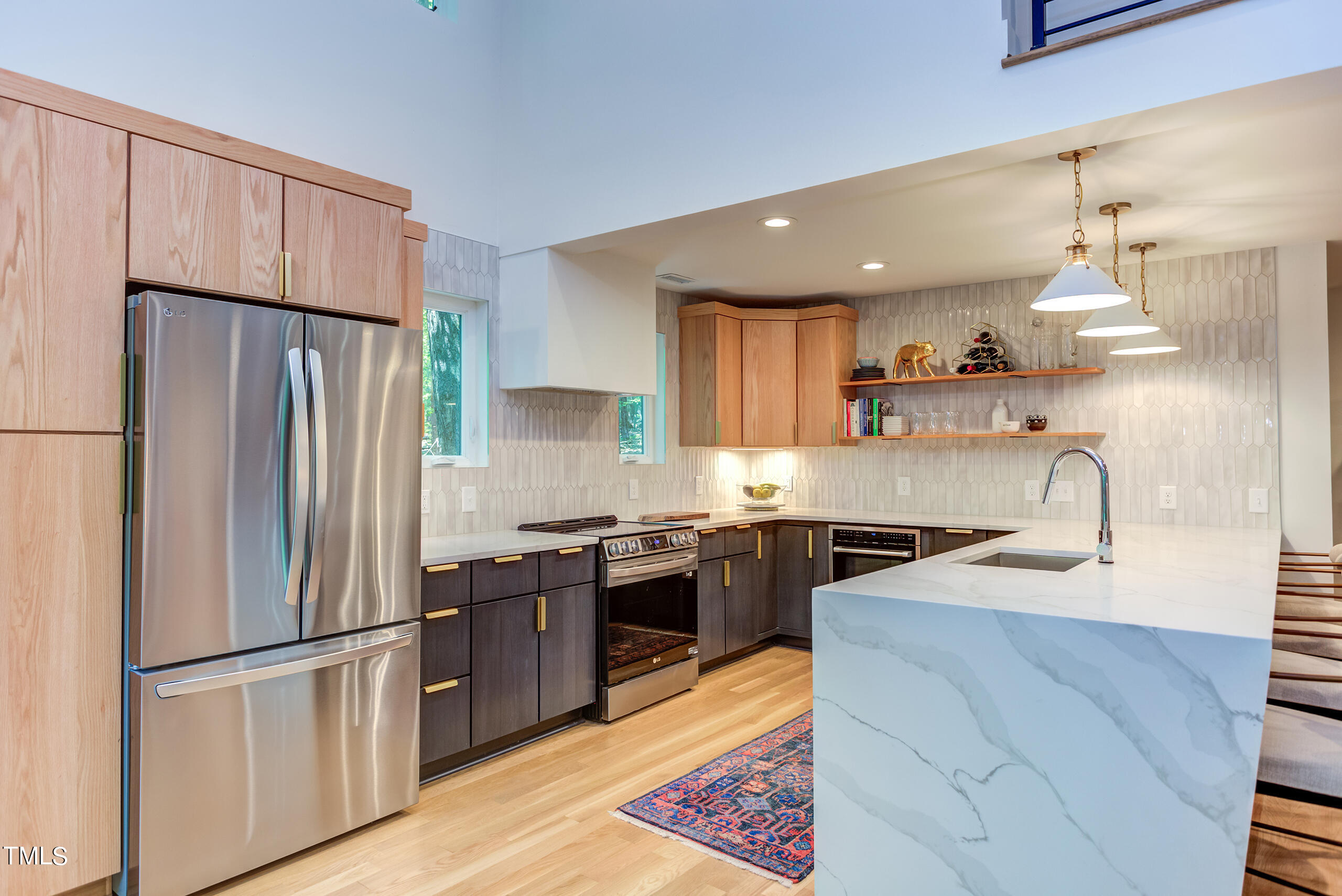 2008 Ridgewood Road Chapel Hill, NC 27516 - Photo 12 of 73 a kitchen with granite countertop a refrigerator stove top oven and sink