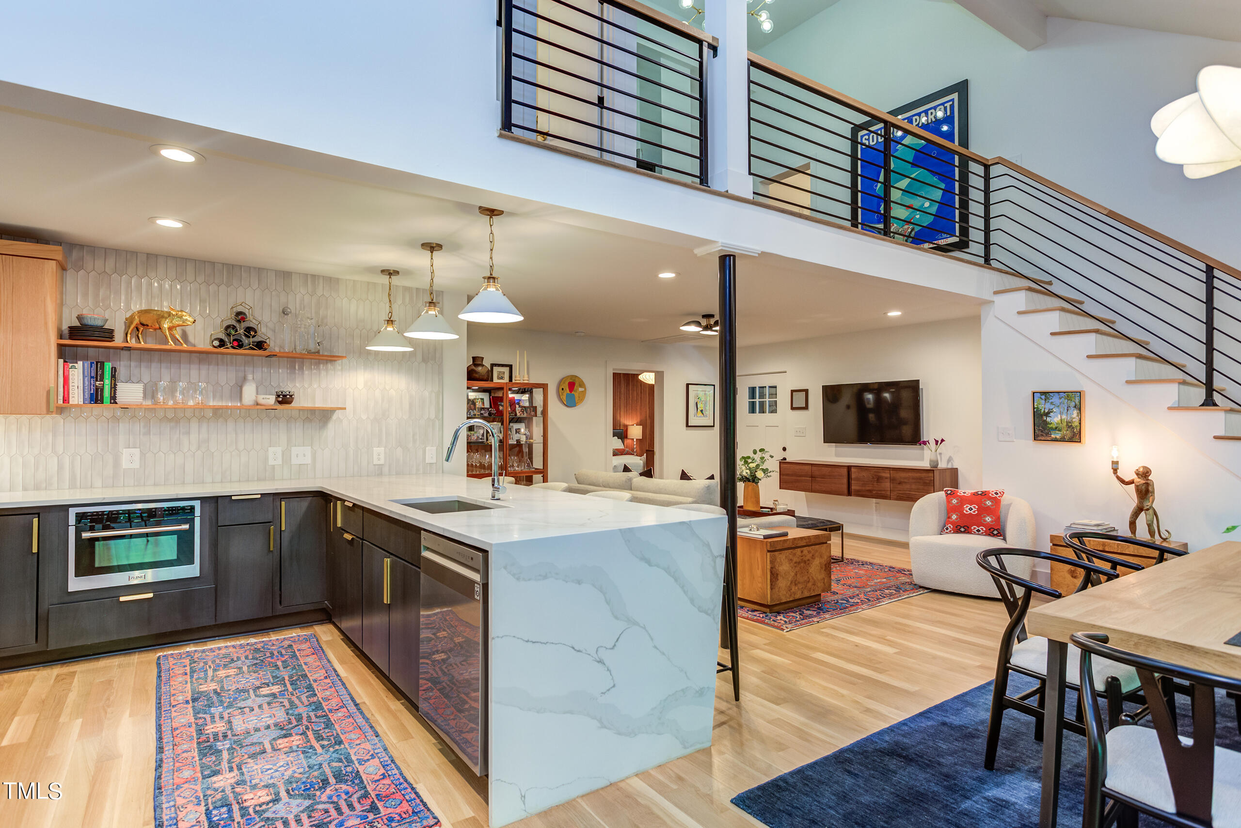 2008 Ridgewood Road Chapel Hill, NC 27516 - Photo 13 of 73 a living room with stainless steel appliances furniture a rug kitchen view and a counter top space