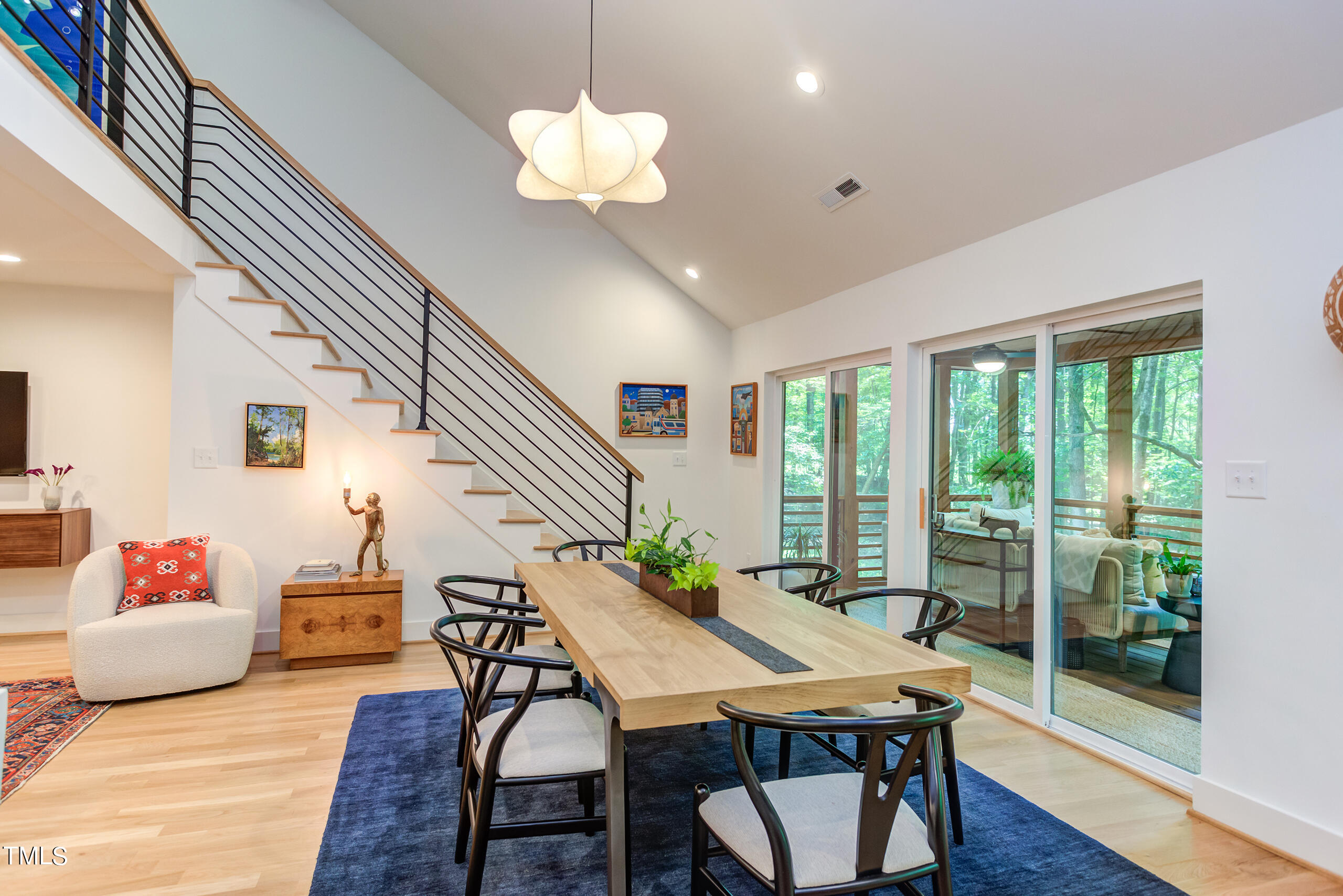 2008 Ridgewood Road Chapel Hill, NC 27516 - Photo 15 of 73 a living room with furniture dining table and a large window