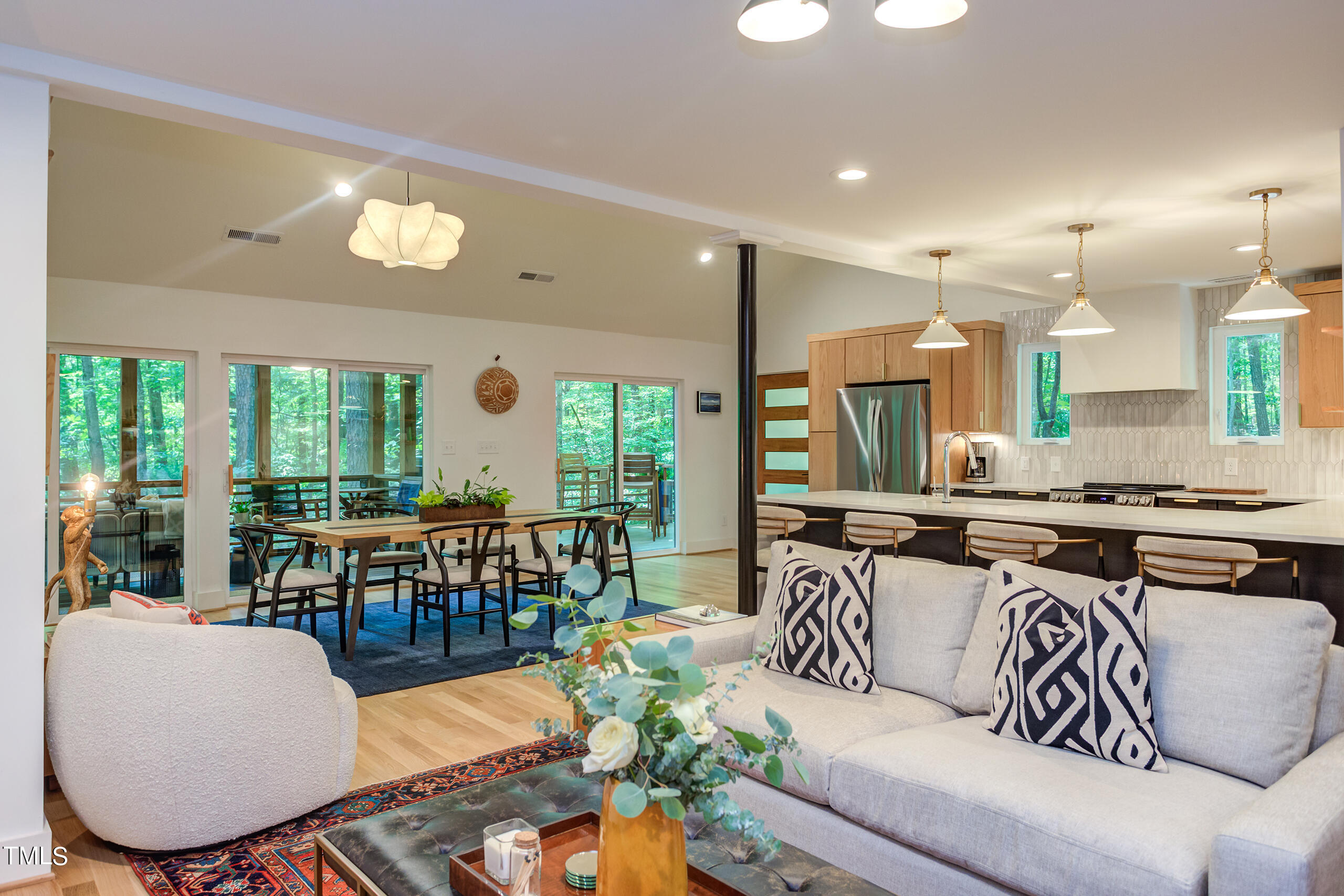 2008 Ridgewood Road Chapel Hill, NC 27516 - Photo 20 of 73 a living room with furniture and a large window