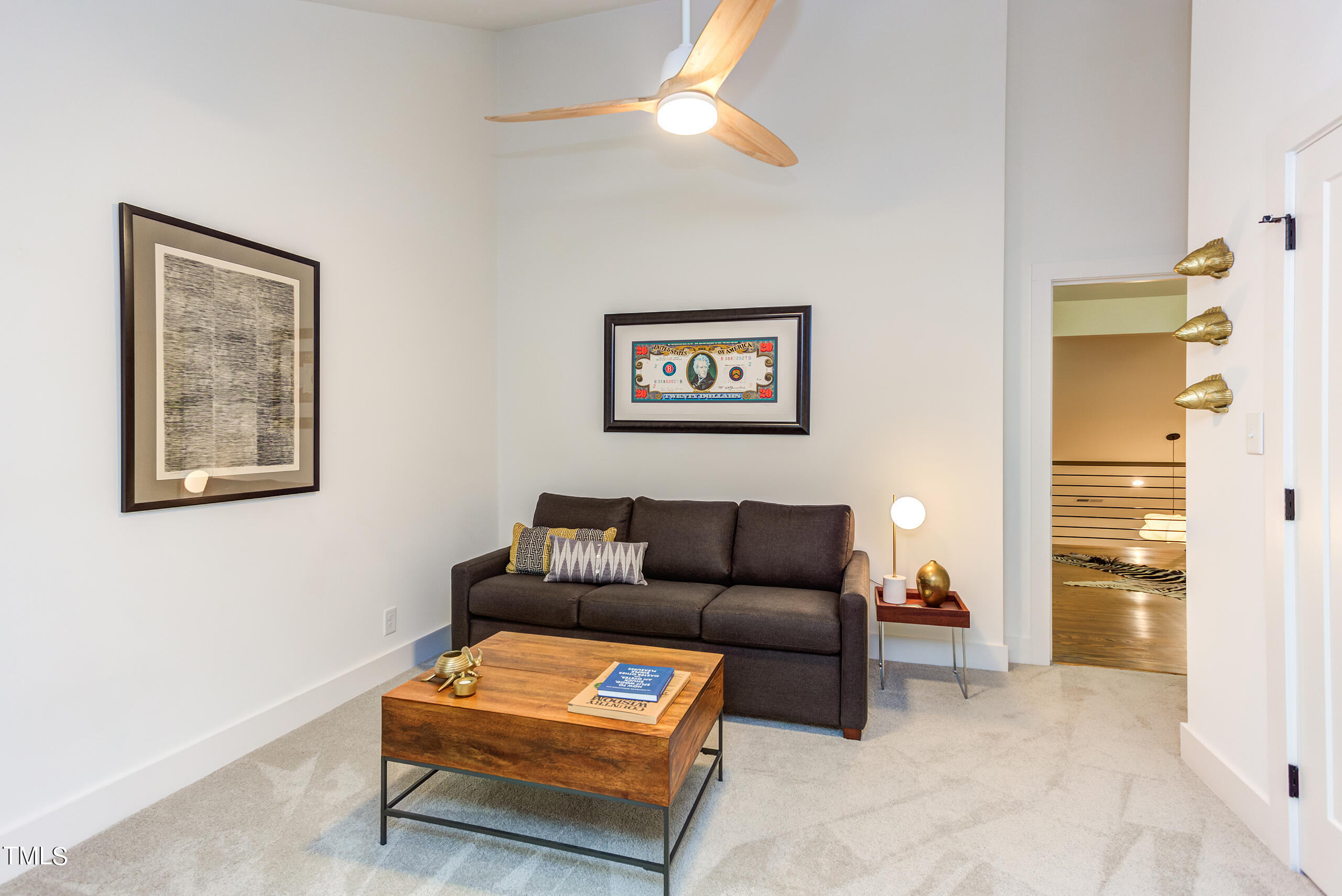 2008 Ridgewood Road Chapel Hill, NC 27516 - Photo 39 of 73 a living room with furniture and a wall painting