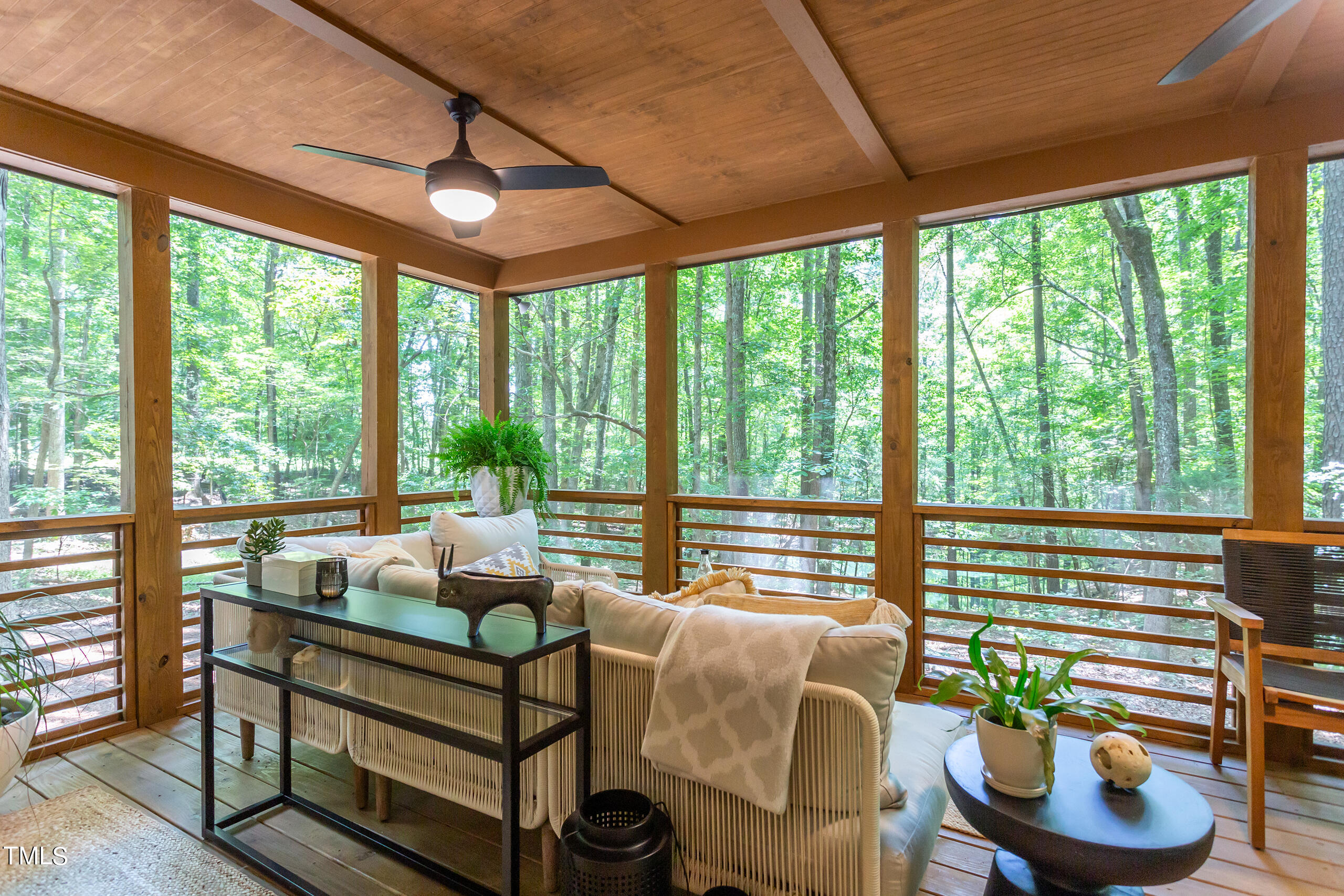 2008 Ridgewood Road Chapel Hill, NC 27516 - Photo 49 of 73 a living room with furniture and a potted plant