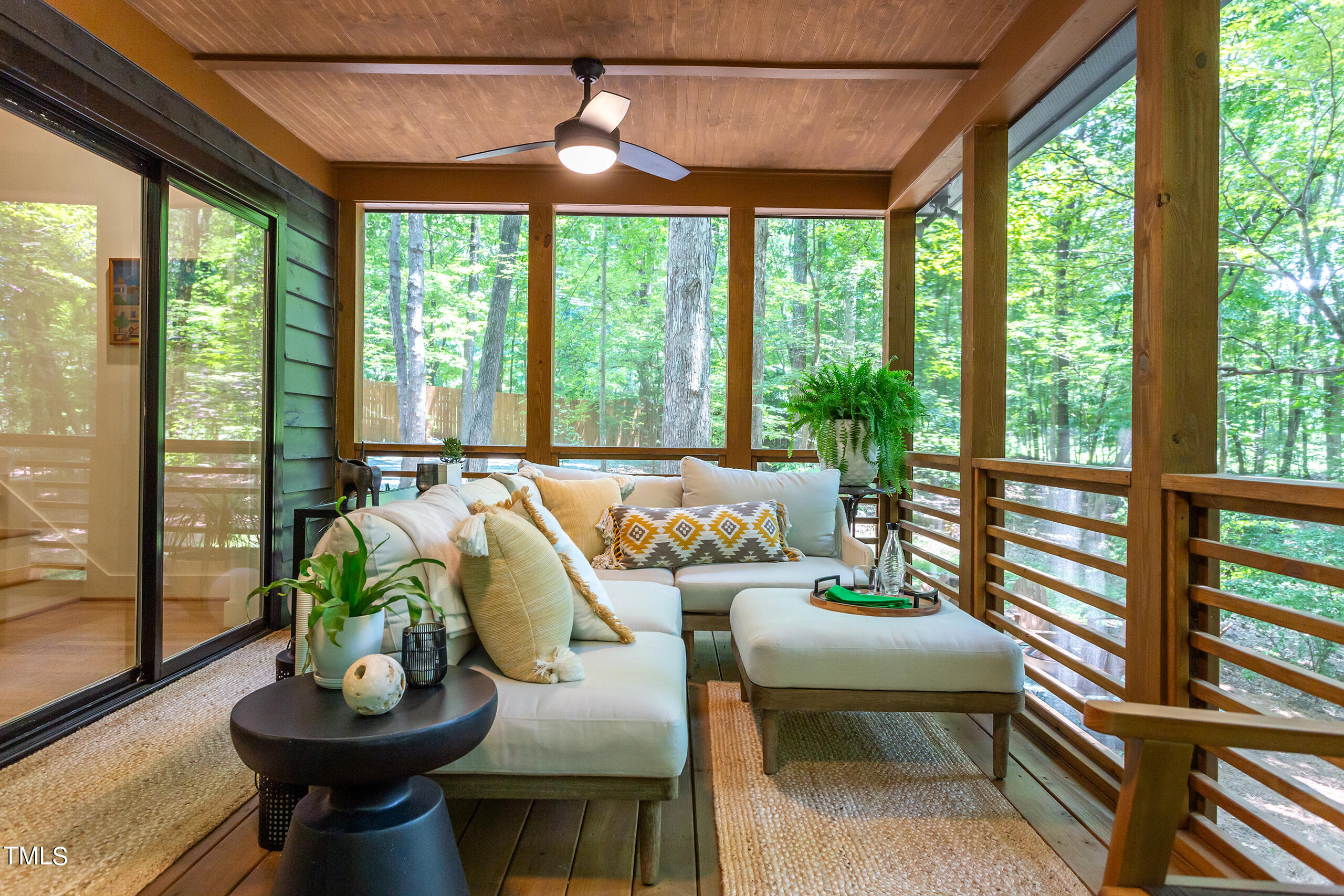 2008 Ridgewood Road Chapel Hill, NC 27516 - Photo 51 of 73 a living room with furniture and a potted plant