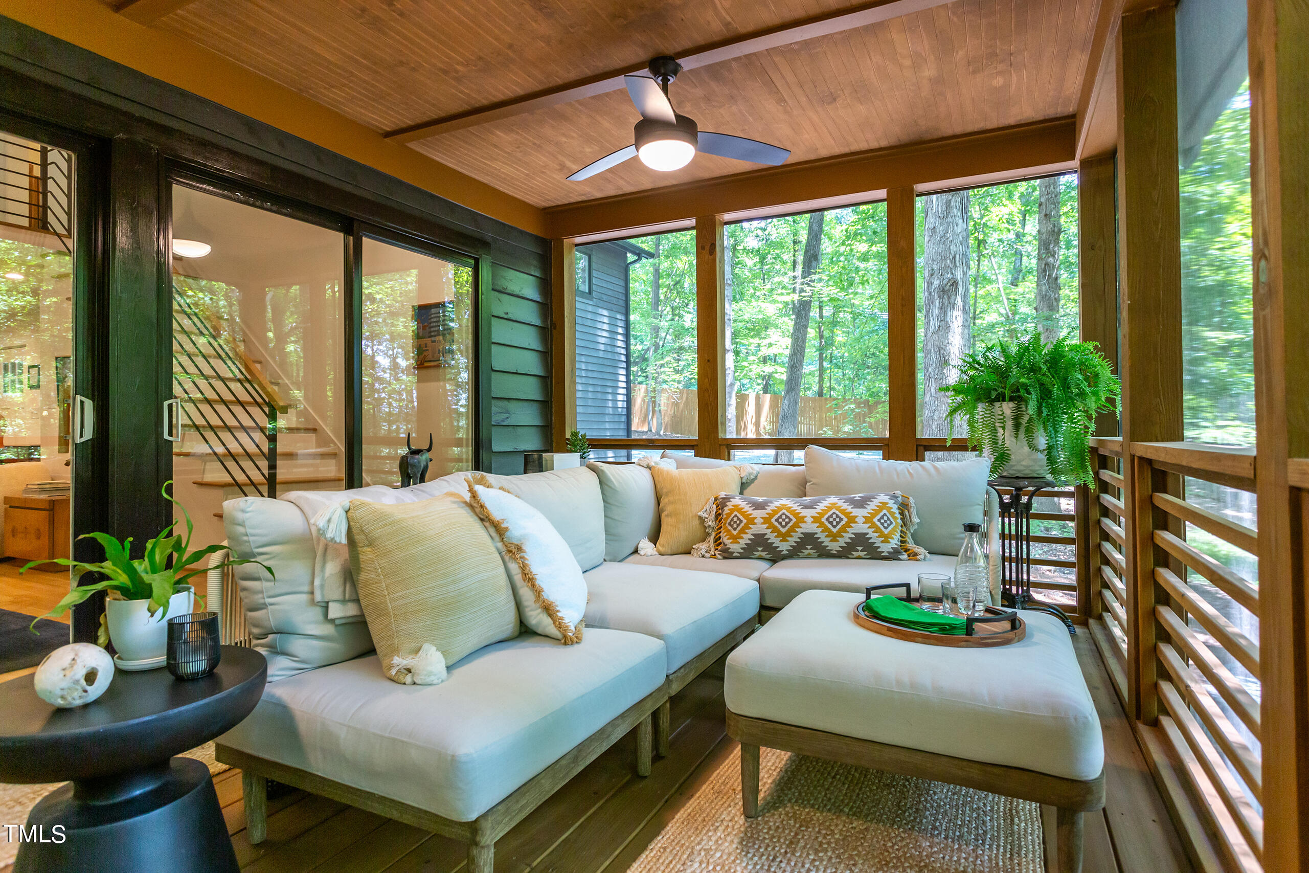 2008 Ridgewood Road Chapel Hill, NC 27516 - Photo 52 of 73 a living room with furniture and a potted plant