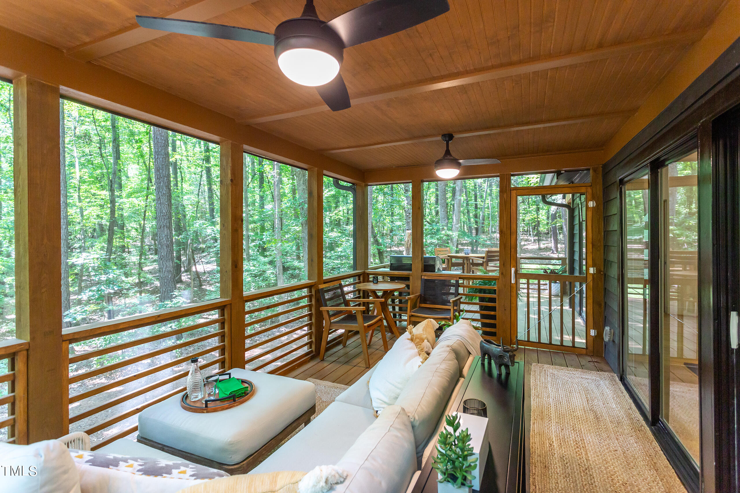 2008 Ridgewood Road Chapel Hill, NC 27516 - Photo 54 of 73 a living room filled with furniture and a table