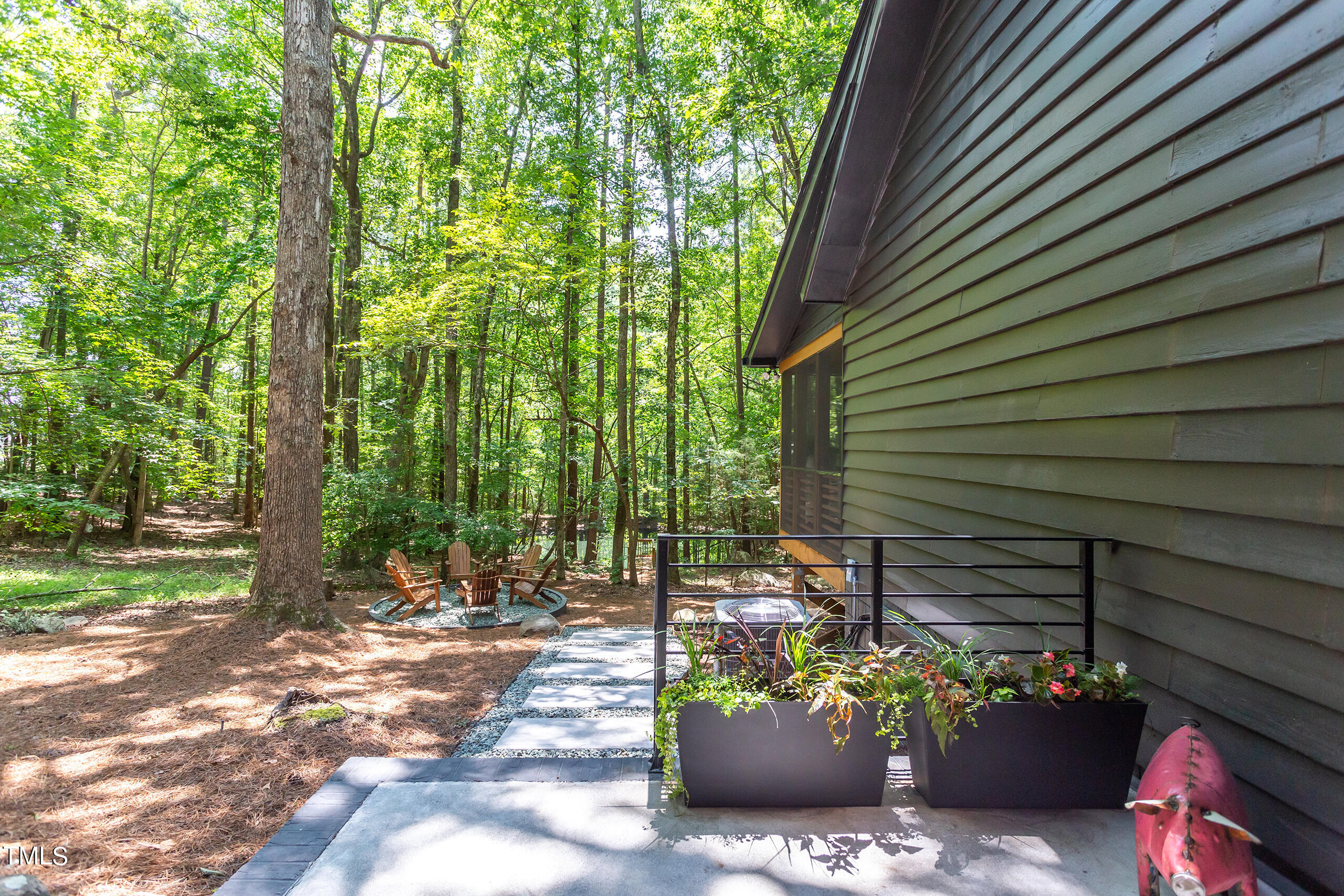 2008 Ridgewood Road Chapel Hill, NC 27516 - Photo 60 of 73 a view of a backyard with a garden