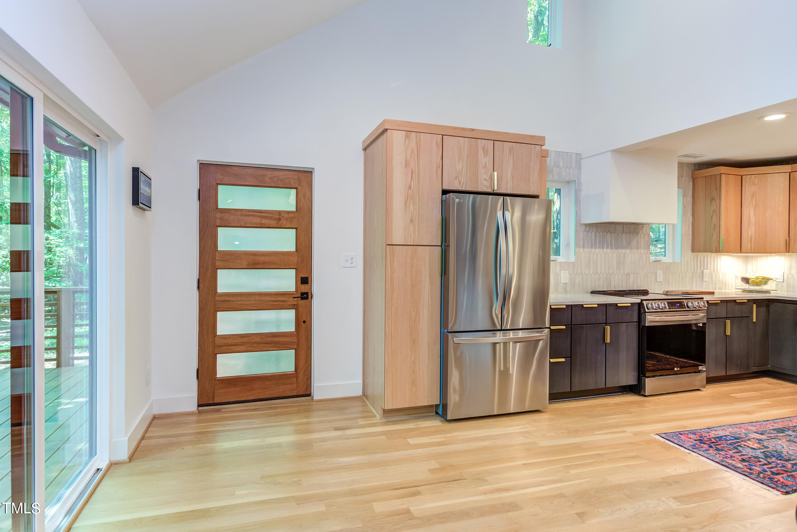 2008 Ridgewood Road Chapel Hill, NC 27516 - Photo 8 of 73 a kitchen with stainless steel appliances granite countertop a refrigerator and a stove top oven