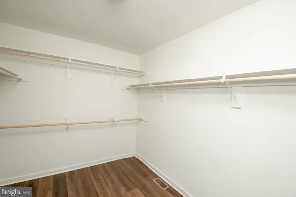 a view of a room with racks on the wall