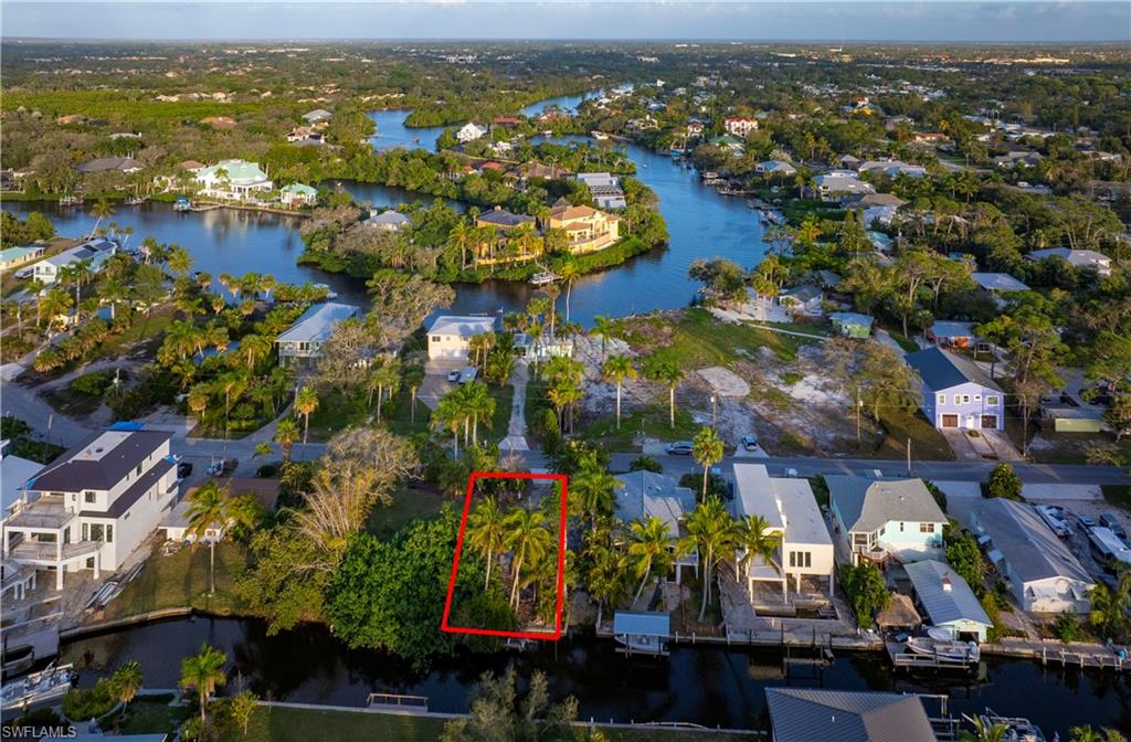 27563 Big Bend Road Bonita Springs, FL 34134 - Photo 6 of 10 an aerial view of residential building with outdoor space