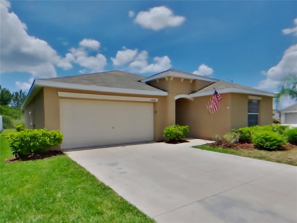 11046 Standing Stone Drive Wimauma, FL 33598 - Photo 1 of 1 a front view of house with yard