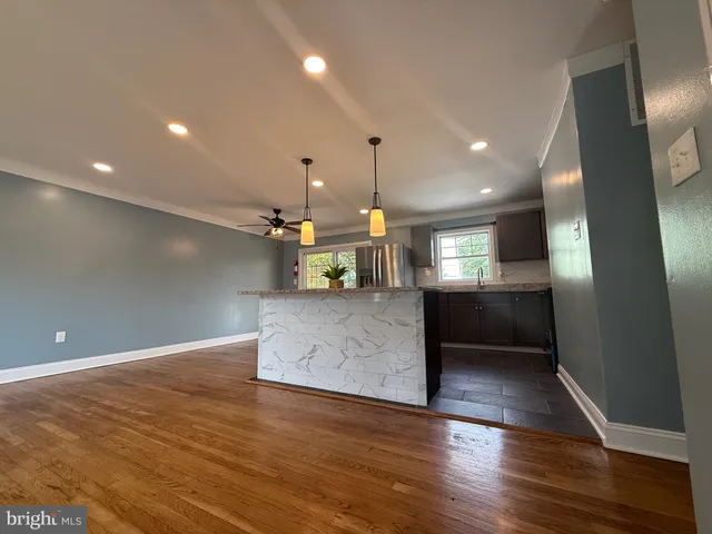 a view of kitchen and natural light
