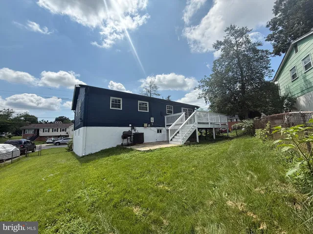 a view of a backyard with a garden