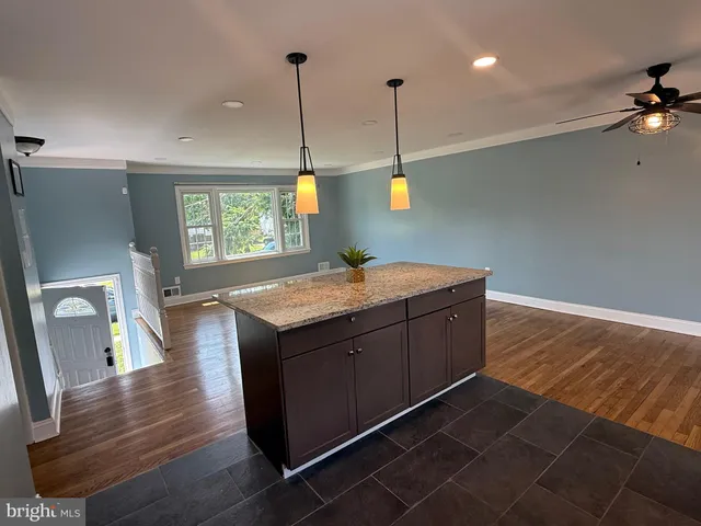 a kitchen with sink and window