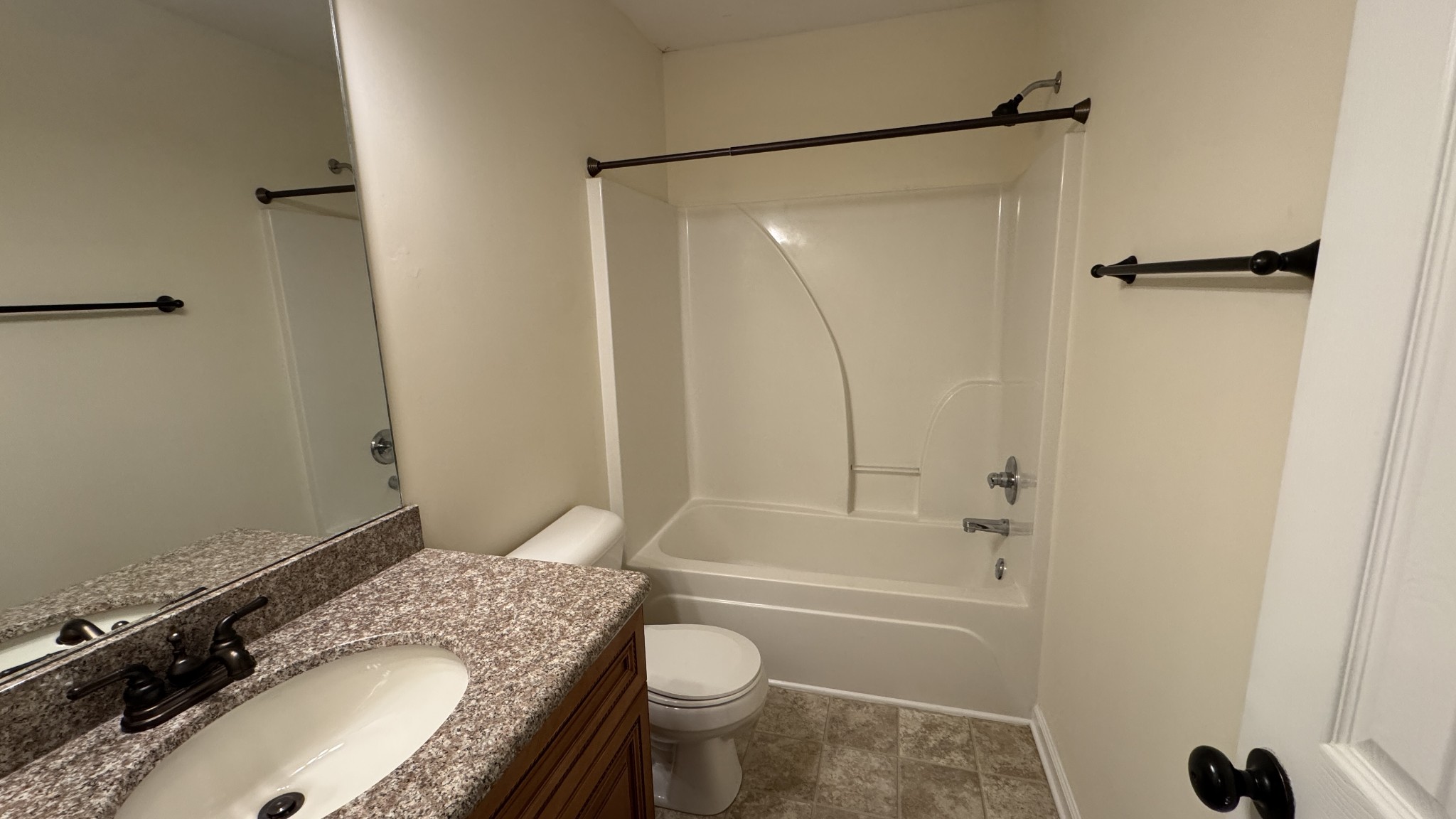 895 Branch Road Clarksville, TN 37043 - Photo 8 of 11 a bathroom with a granite countertop sink toilet and shower