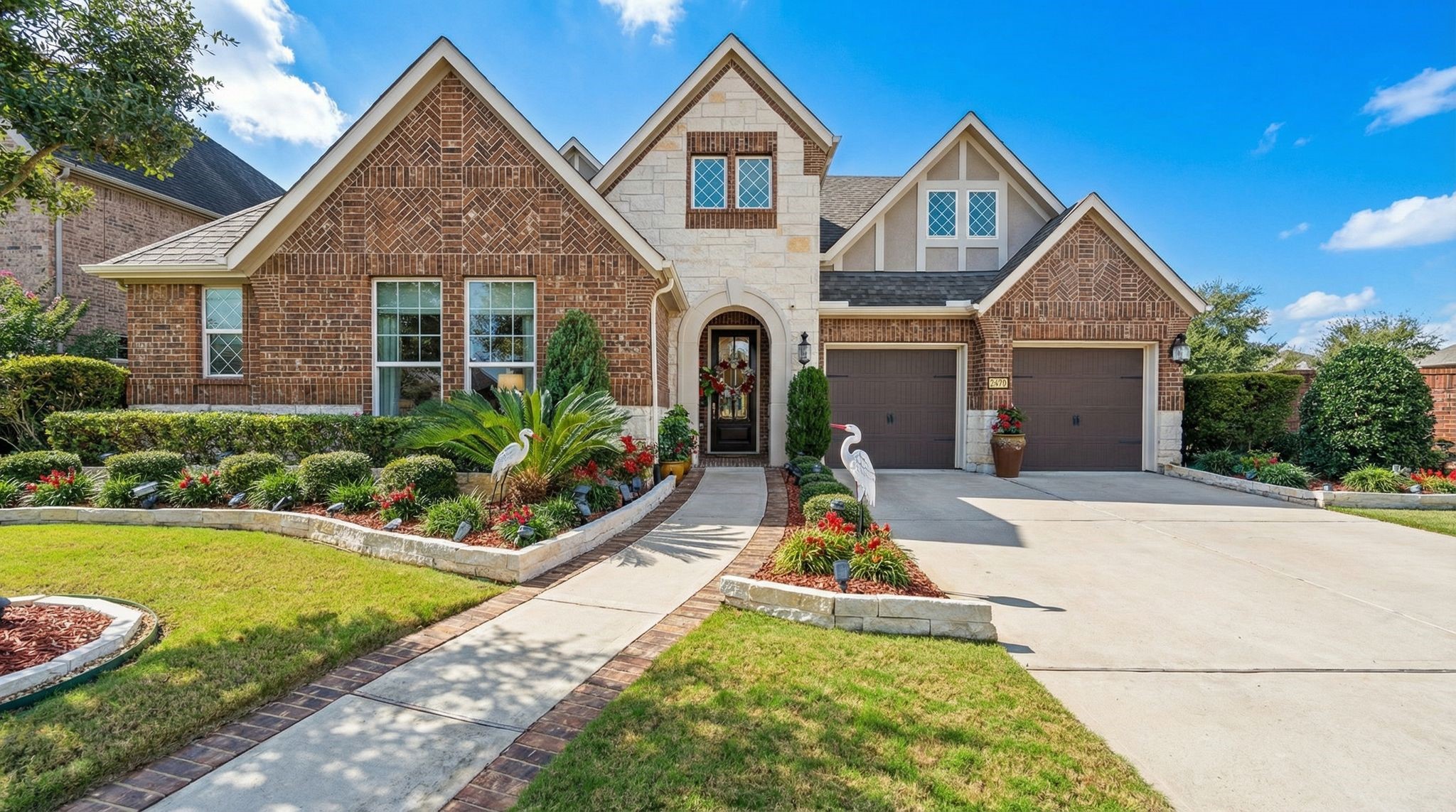 51 Scepter Ridge Sugar Land, TX 77498 - Photo 1 of 50 a front view of a house with garden