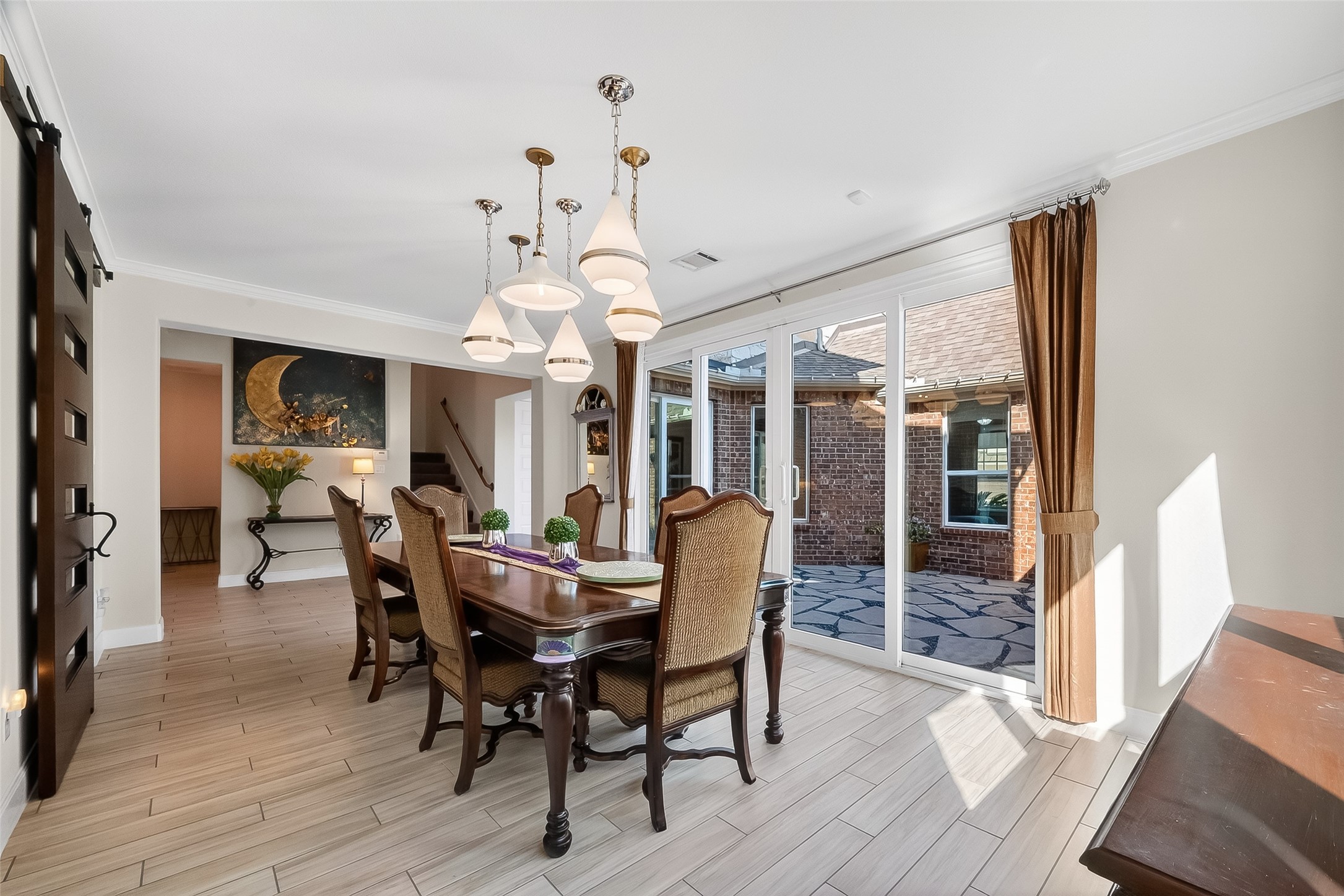 51 Scepter Ridge Sugar Land, TX 77498 - Photo 12 of 50 a view of a dining room with furniture window and wooden floor
