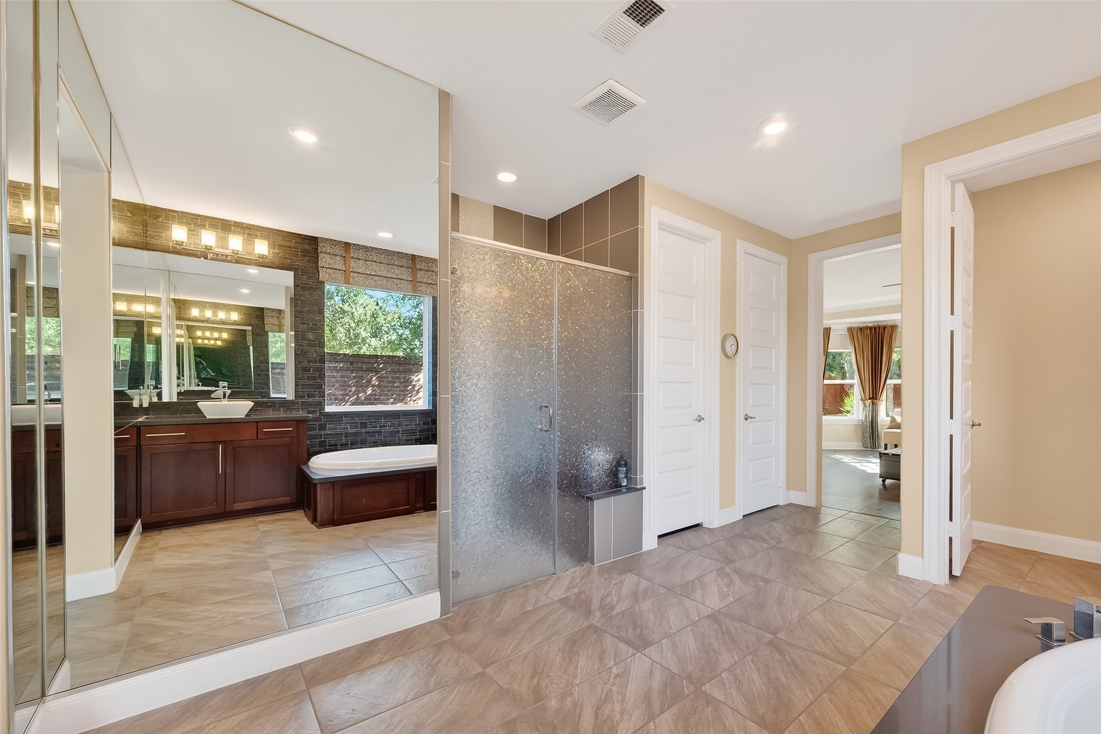 51 Scepter Ridge Sugar Land, TX 77498 - Photo 35 of 50 a bathroom with a tub shower and couch