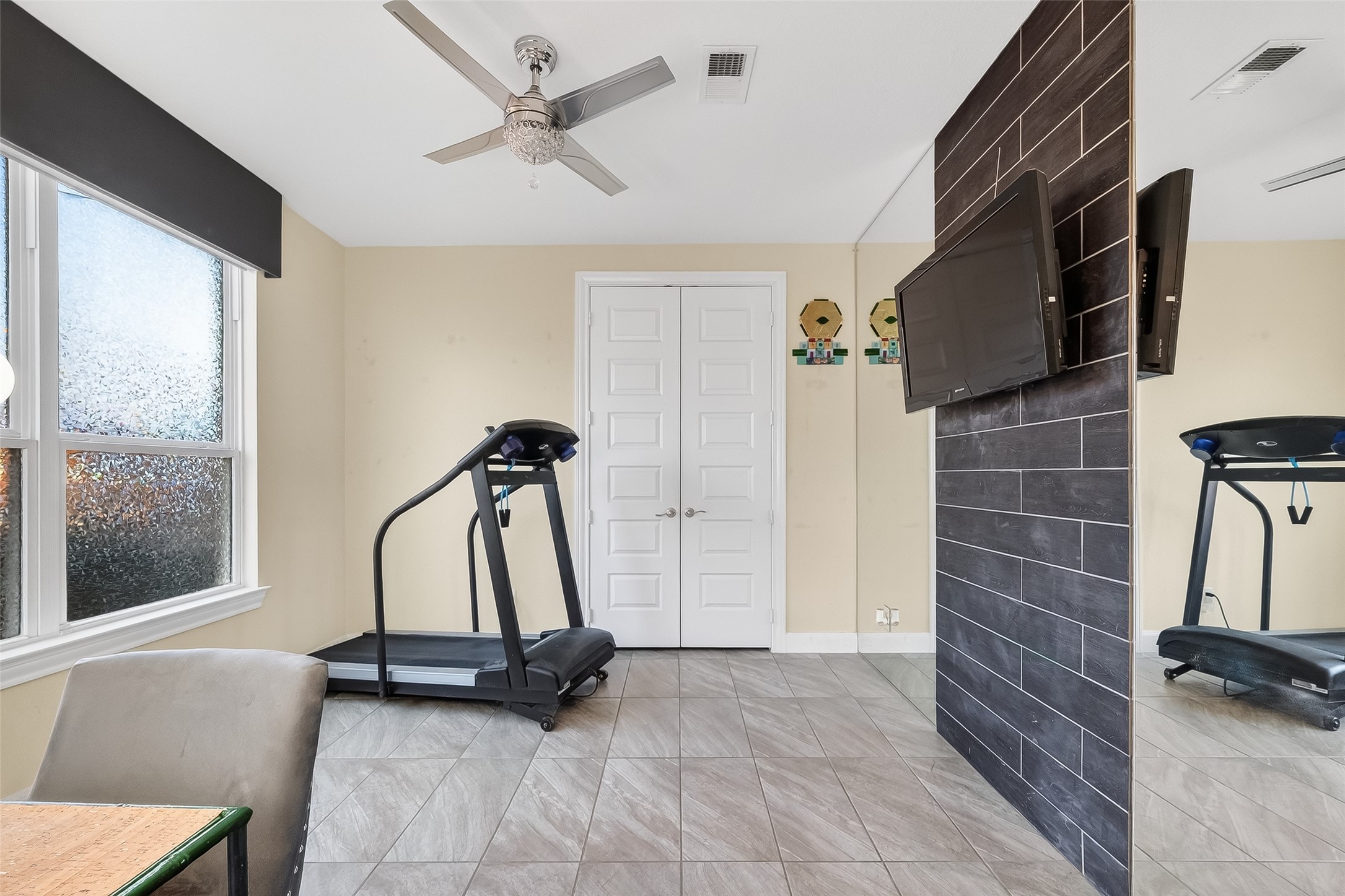 51 Scepter Ridge Sugar Land, TX 77498 - Photo 36 of 50 a view of a room with gym equipment