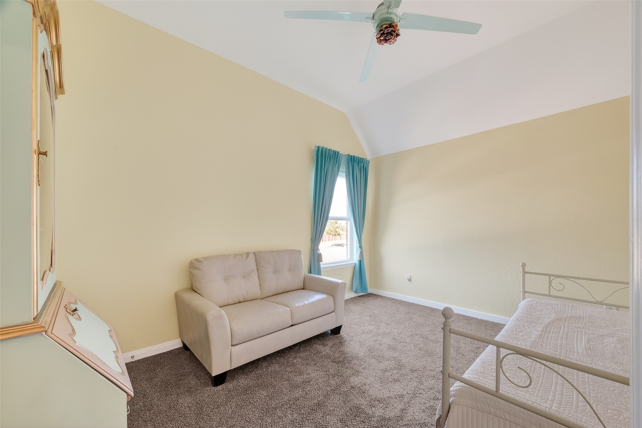 51 Scepter Ridge Sugar Land, TX 77498 - Photo 37 of 48 There are 2 bedrooms upstairs, providing a comfortable retreat with carpeted floors and large windows for natural light.