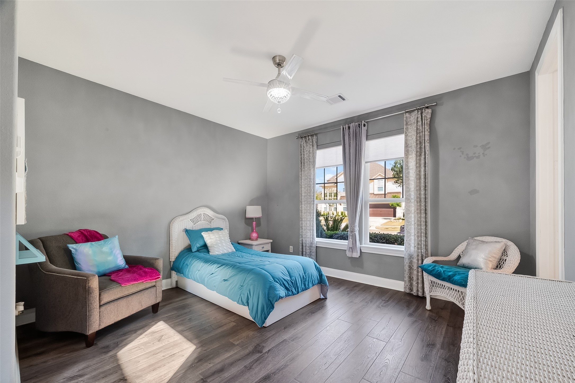 51 Scepter Ridge Sugar Land, TX 77498 - Photo 4 of 50 a bedroom with a bed and wooden floor