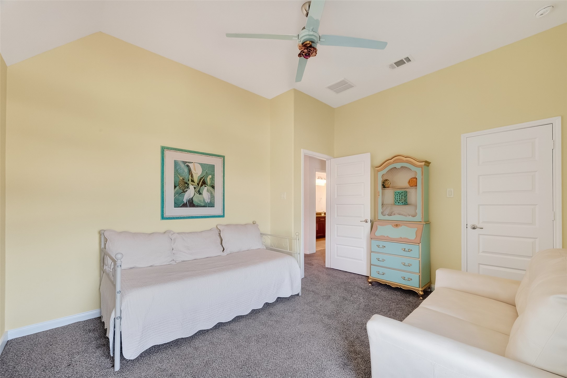 51 Scepter Ridge Sugar Land, TX 77498 - Photo 43 of 50 a bedroom with a bed and a couch