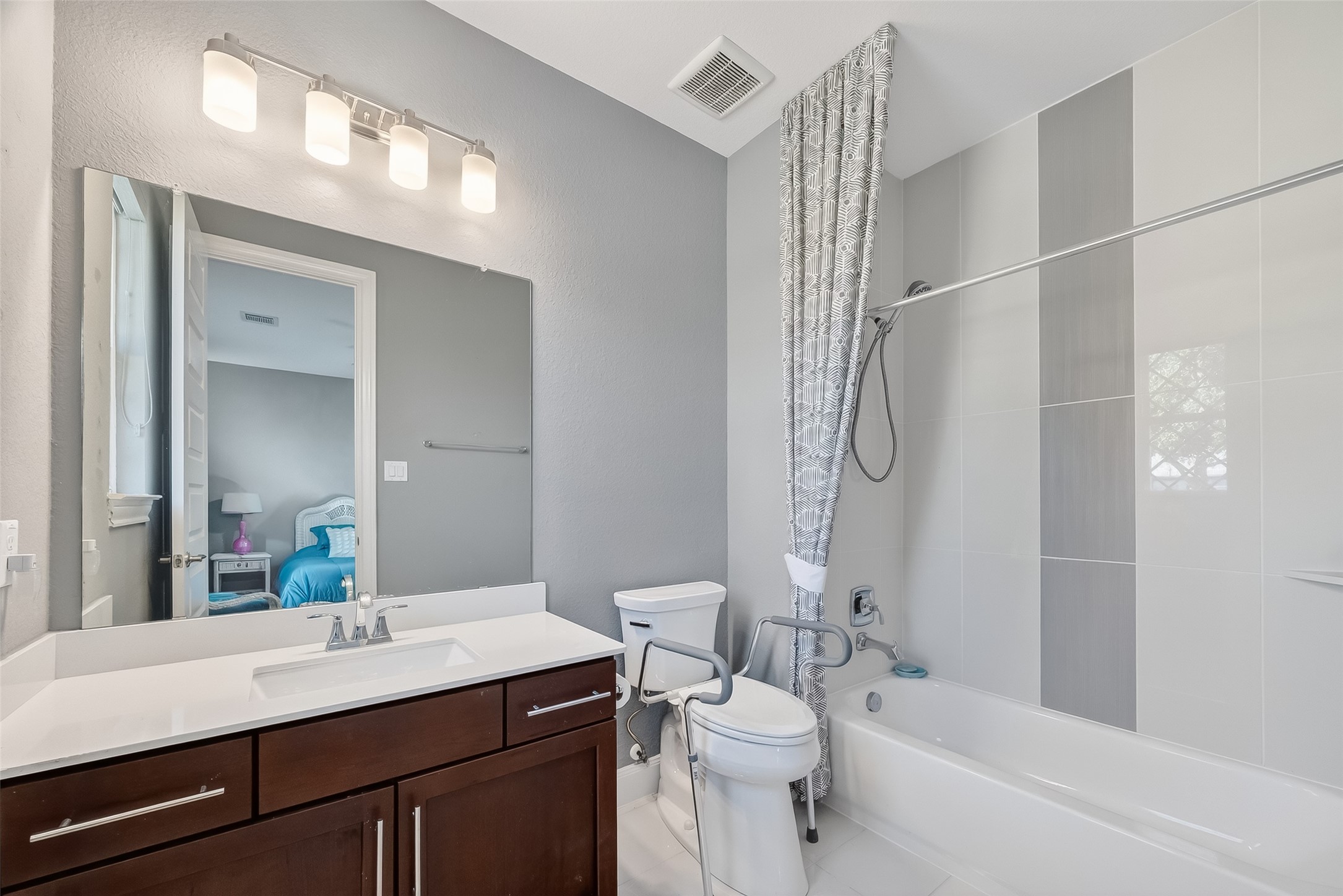 51 Scepter Ridge Sugar Land, TX 77498 - Photo 6 of 50 a bathroom with a sink a toilet and shower