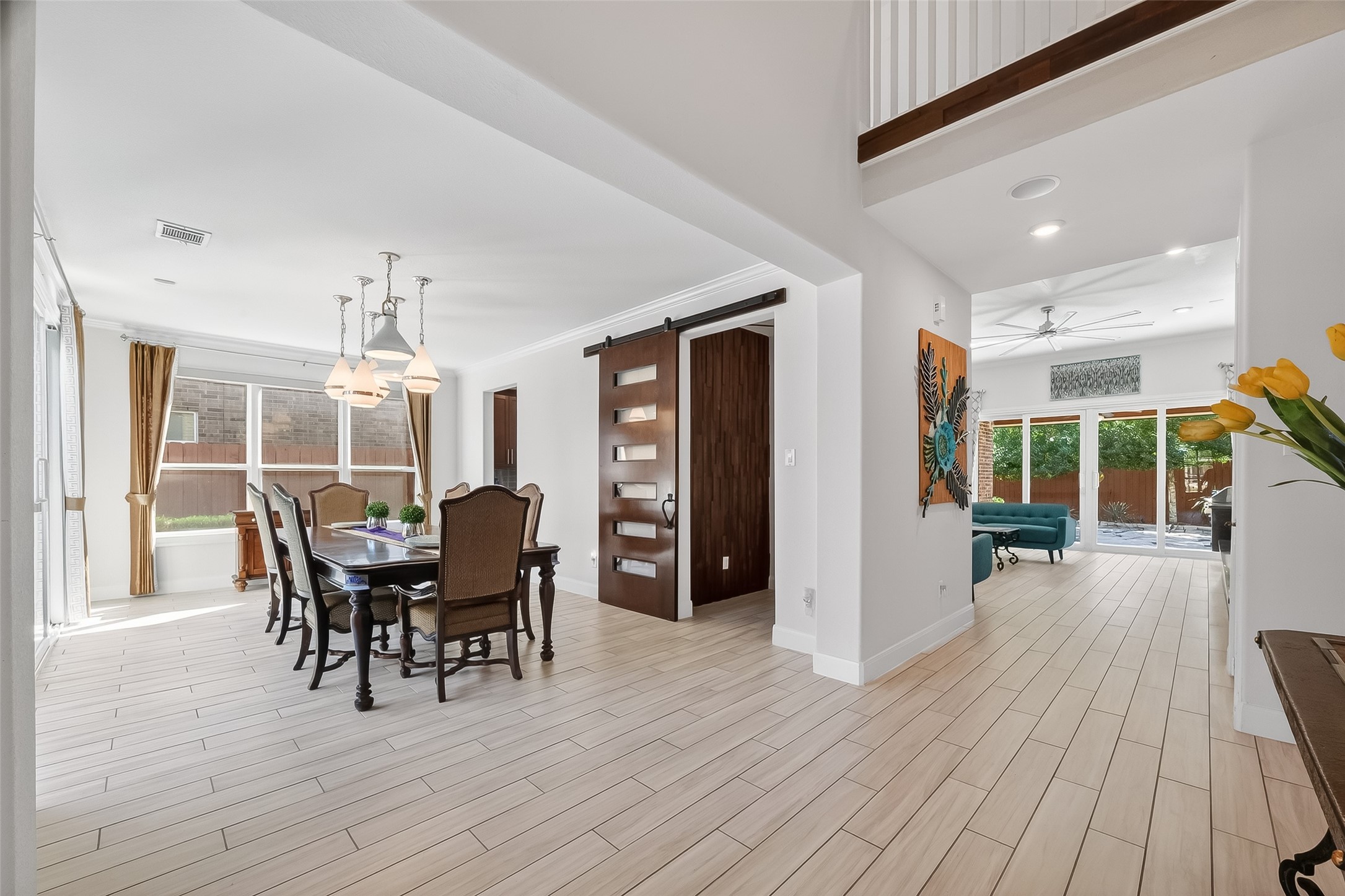 51 Scepter Ridge Sugar Land, TX 77498 - Photo 9 of 50 a view of a dining room with furniture and wooden floor