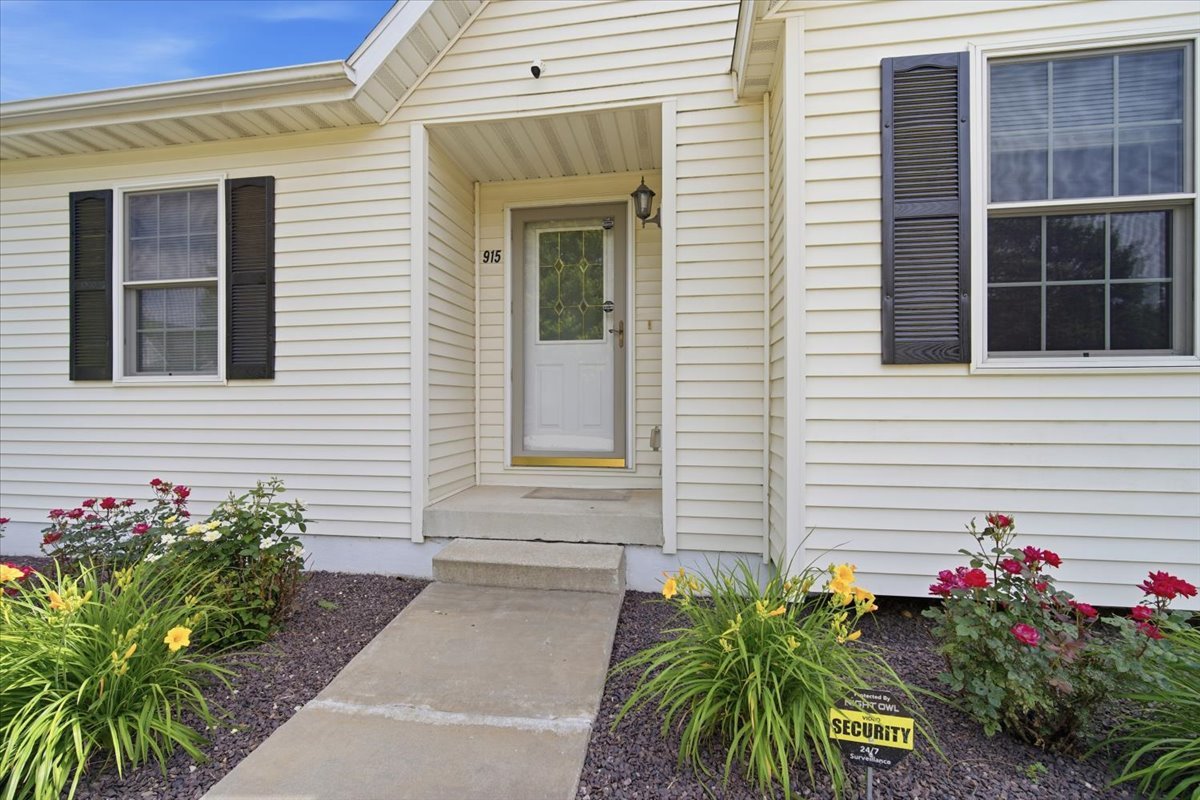 915 Teegan Street Normal, IL 61761 - Photo 2 of 33 a view of a house with a potted plant