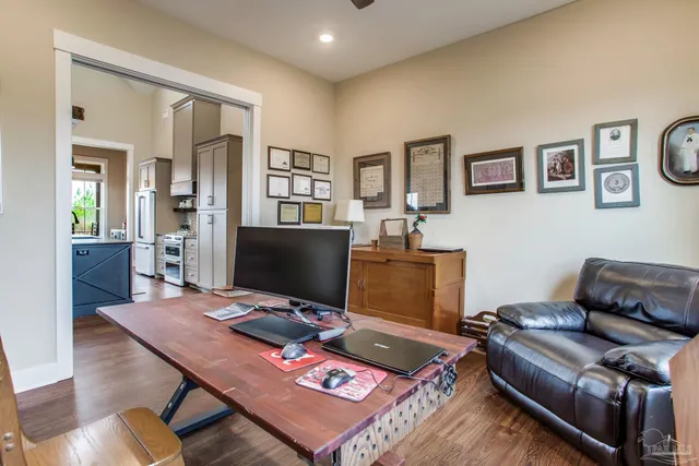 a workspace with furniture and window