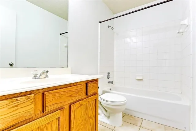 a bathroom with a sink a toilet and a bathtub