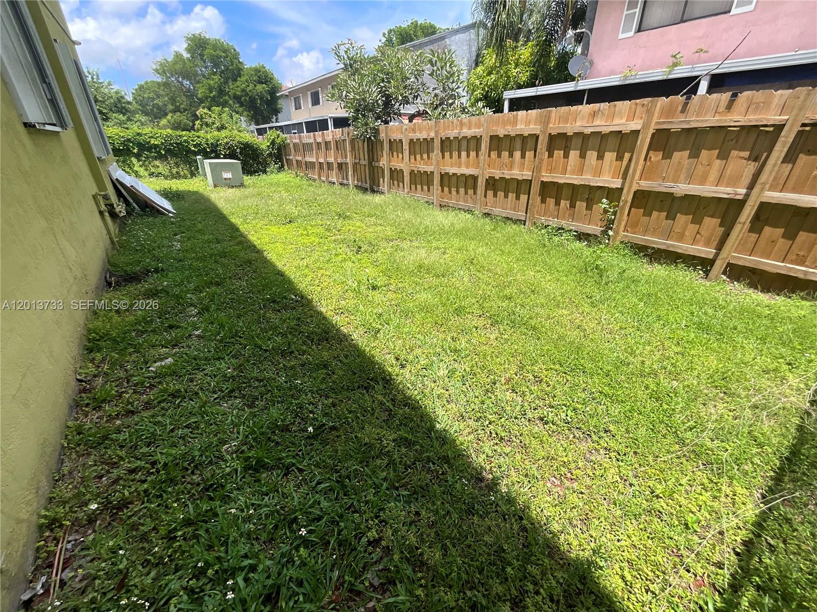 209 Northeast 141st Street, Unit 4 Miami, FL 33161 - Photo 13 of 13 a view of an outdoor space with a lake view