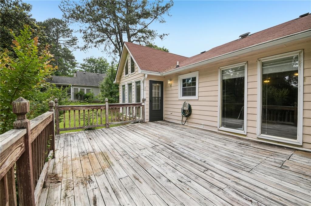 1318 Panhandle Way Hampton, GA 30228 - Photo 17 of 22 a view of a house with a patio