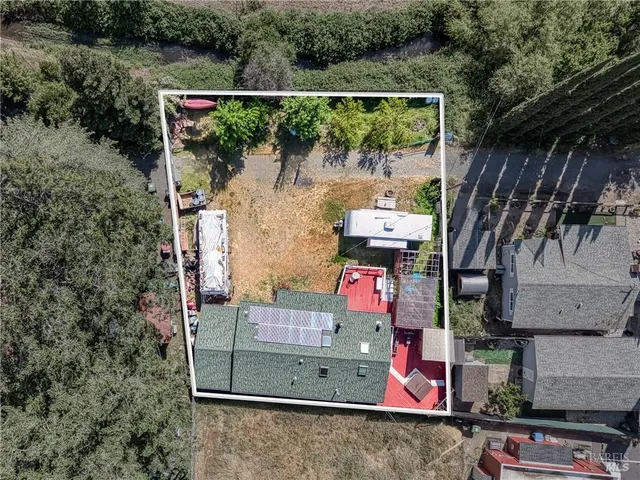 an outdoor space with wooden fence