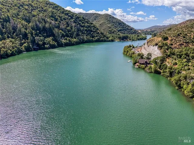 a view of a lake from a yard
