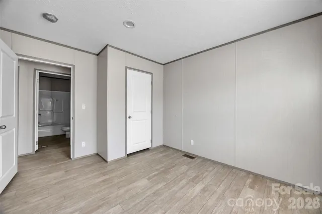 a bathroom with a granite countertop sink mirror and double