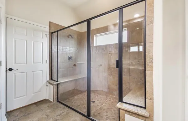 a bathroom with a sink double vanity and a mirror