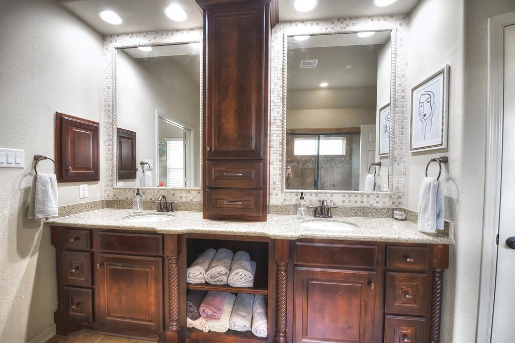 29011 Powder Ridge Drive Katy, TX 77494 - Photo 16 of 25 a bathroom with a sink double vanity and a mirror