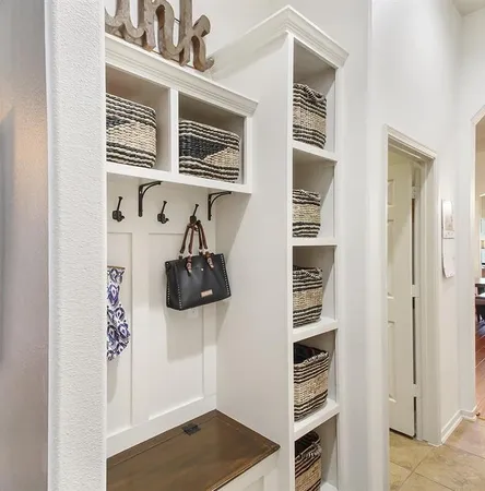 a pathway of a house with a yard