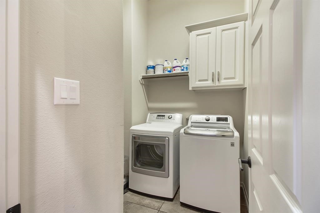 29011 Powder Ridge Drive Katy, TX 77494 - Photo 21 of 25 a utility room with dryer and washer