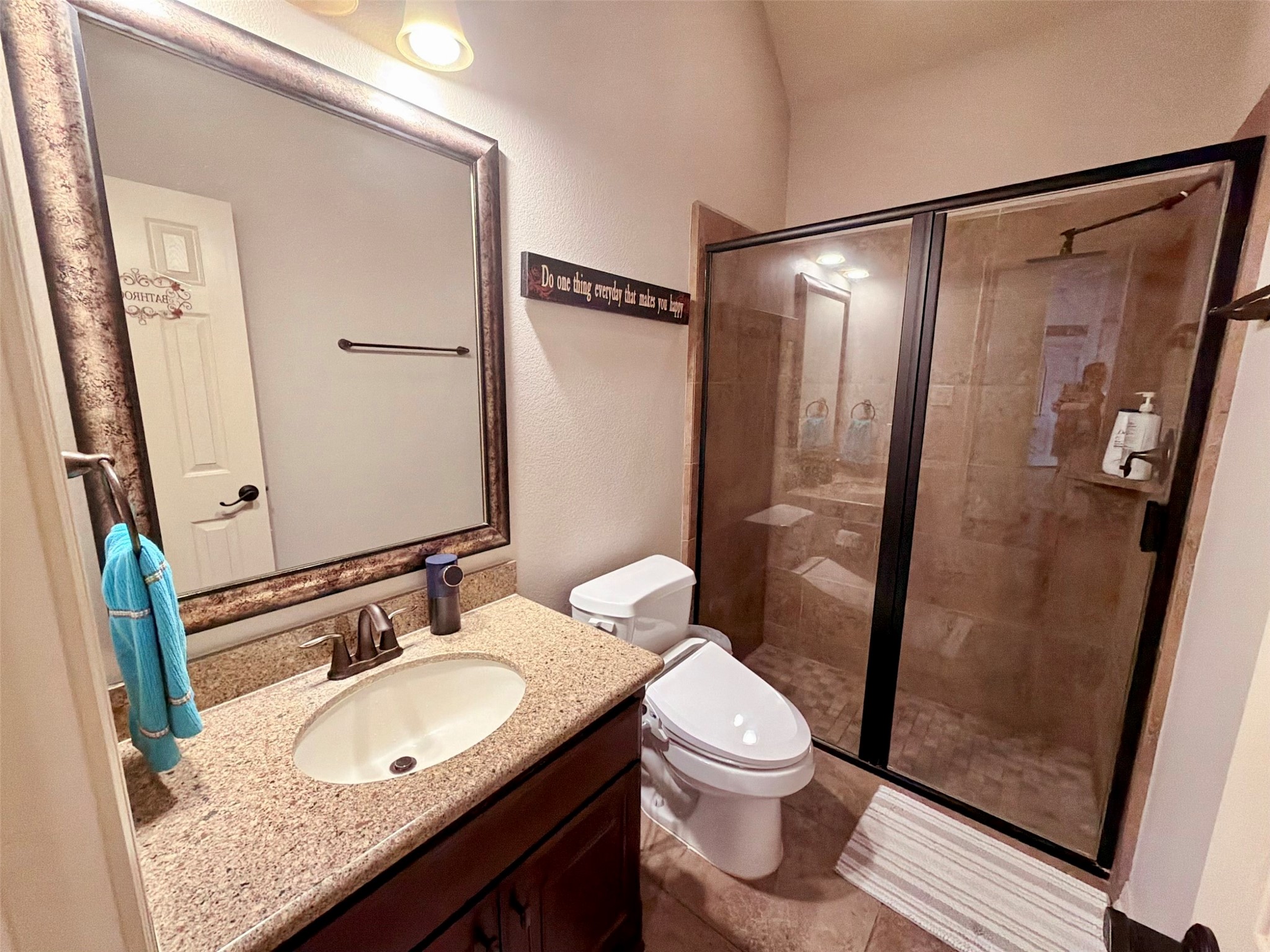29011 Powder Ridge Drive Katy, TX 77494 - Photo 5 of 25 a bathroom with a granite countertop sink toilet and shower