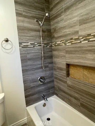 a bathroom with a sink and a shower