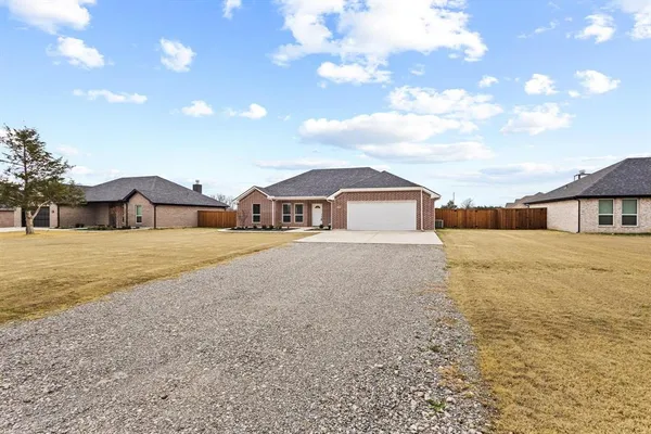 a front view of house with yard