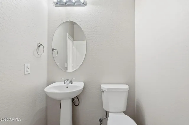 a bathroom with a bathtub a sink a vanity and a shower
